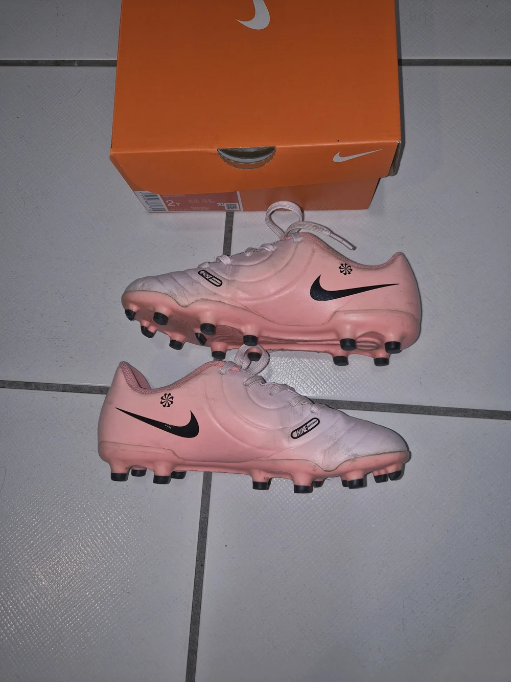 Nike Pink Soccer Cleats with Black Swoosh
